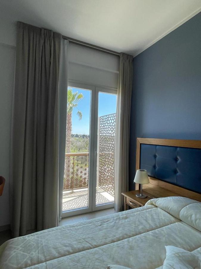 Hotel Posidonia بورتو سيساريو المظهر الخارجي الصورة